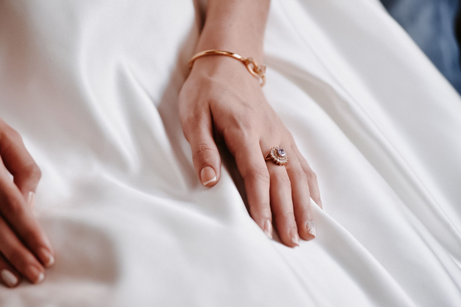 Rings on hand near lips